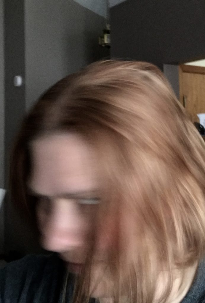 bury photograph of a girls head moving
