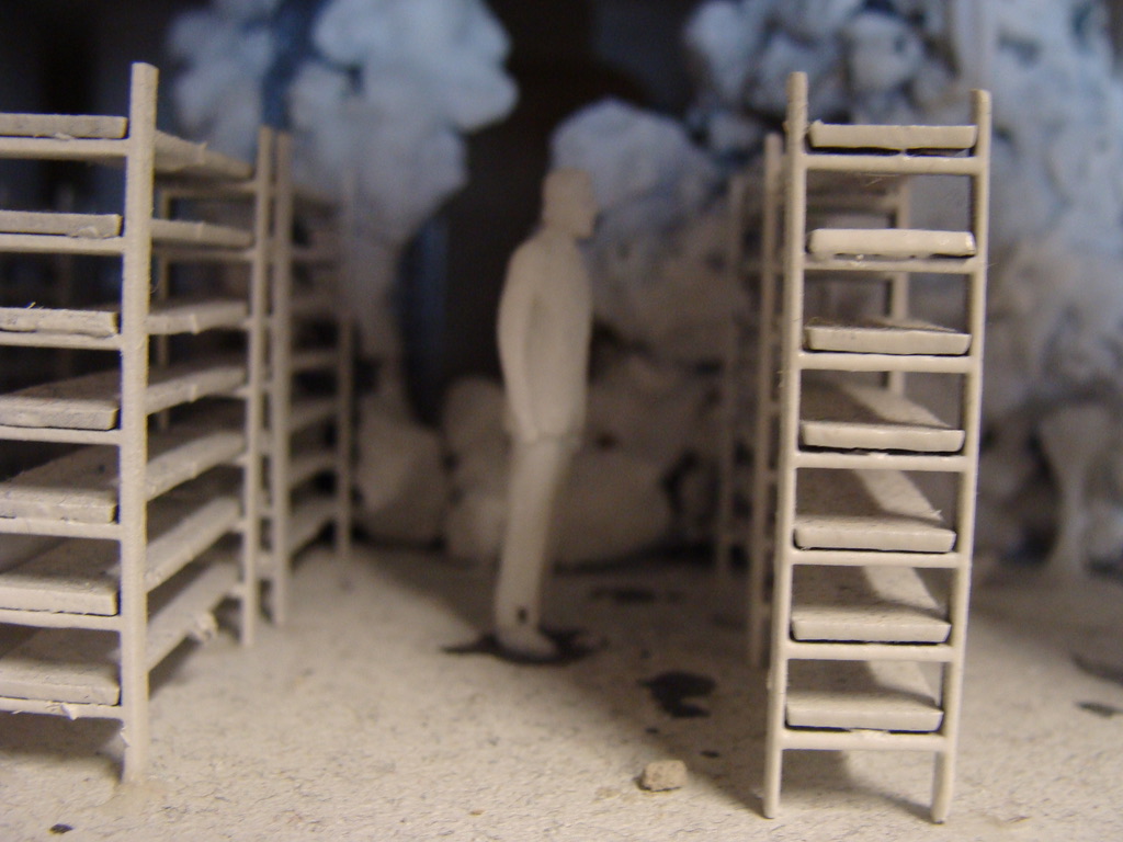 Close up of a model of a person with shelves next to him