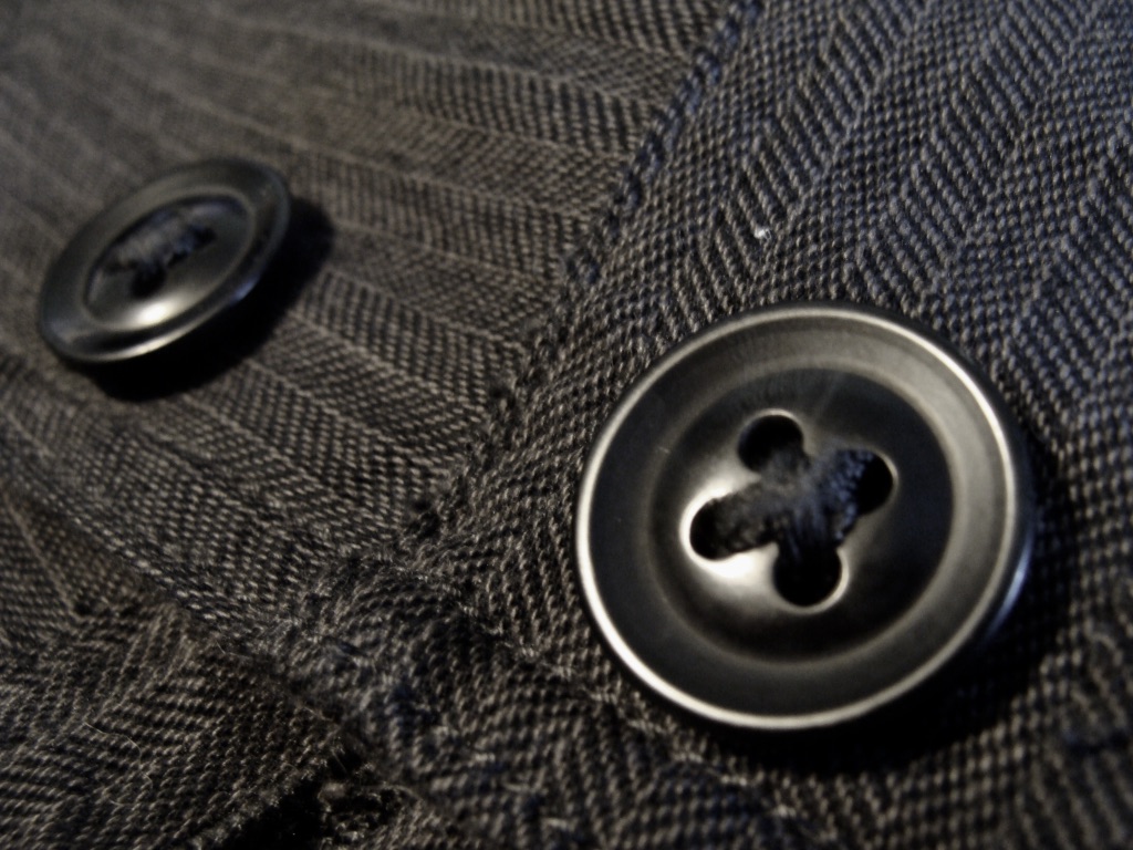 2 buttons on a jacket