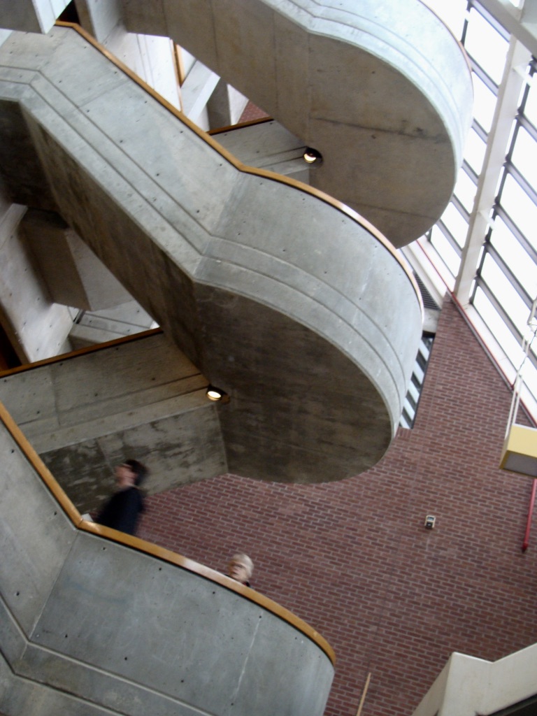 An exposed open air set of stairs inside a building