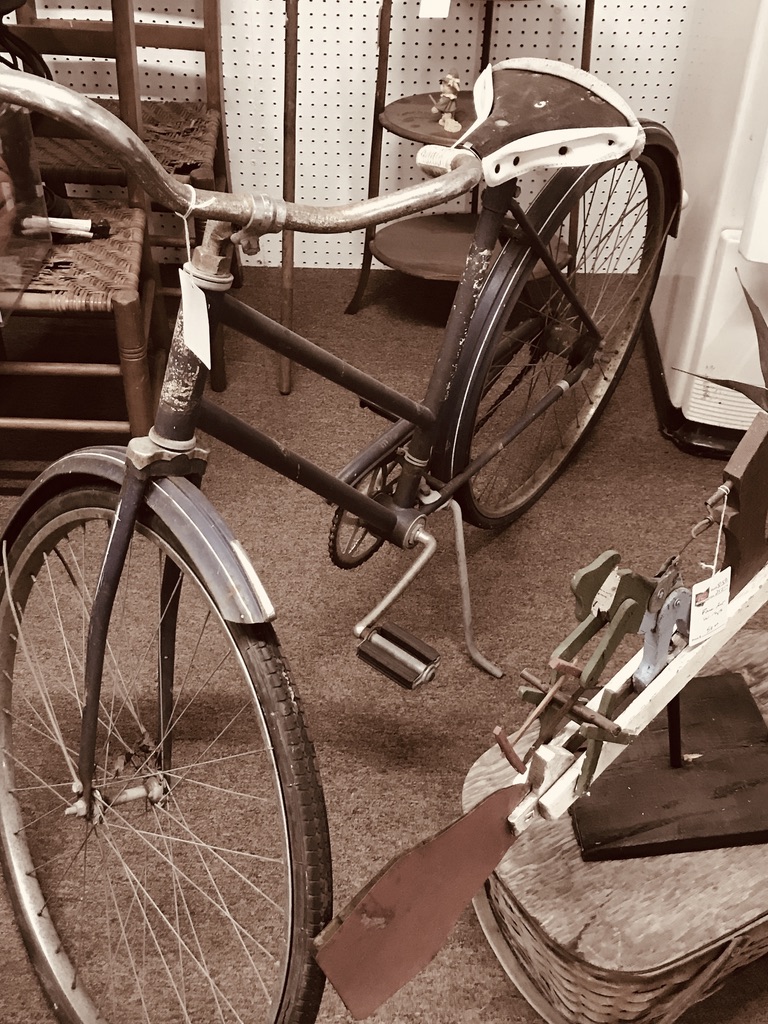 Old bike in a sepia tone