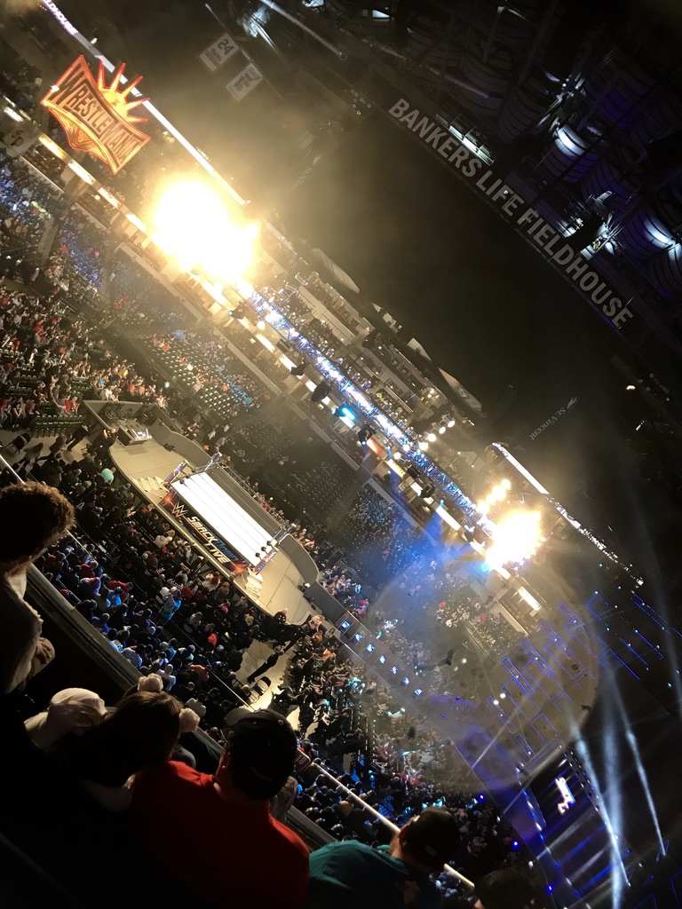 WWE Smackdown wrestling at Bankers Life Fieldhouse with a lens flare on image.