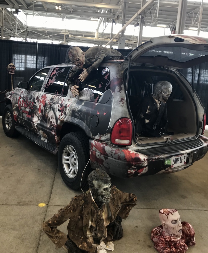An SUV vehicle with zombies in it