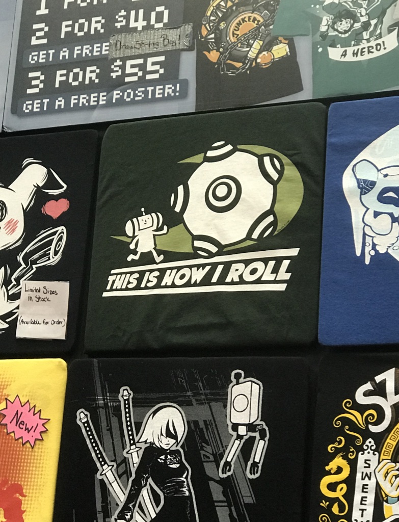 a wall of tee shirts displayed