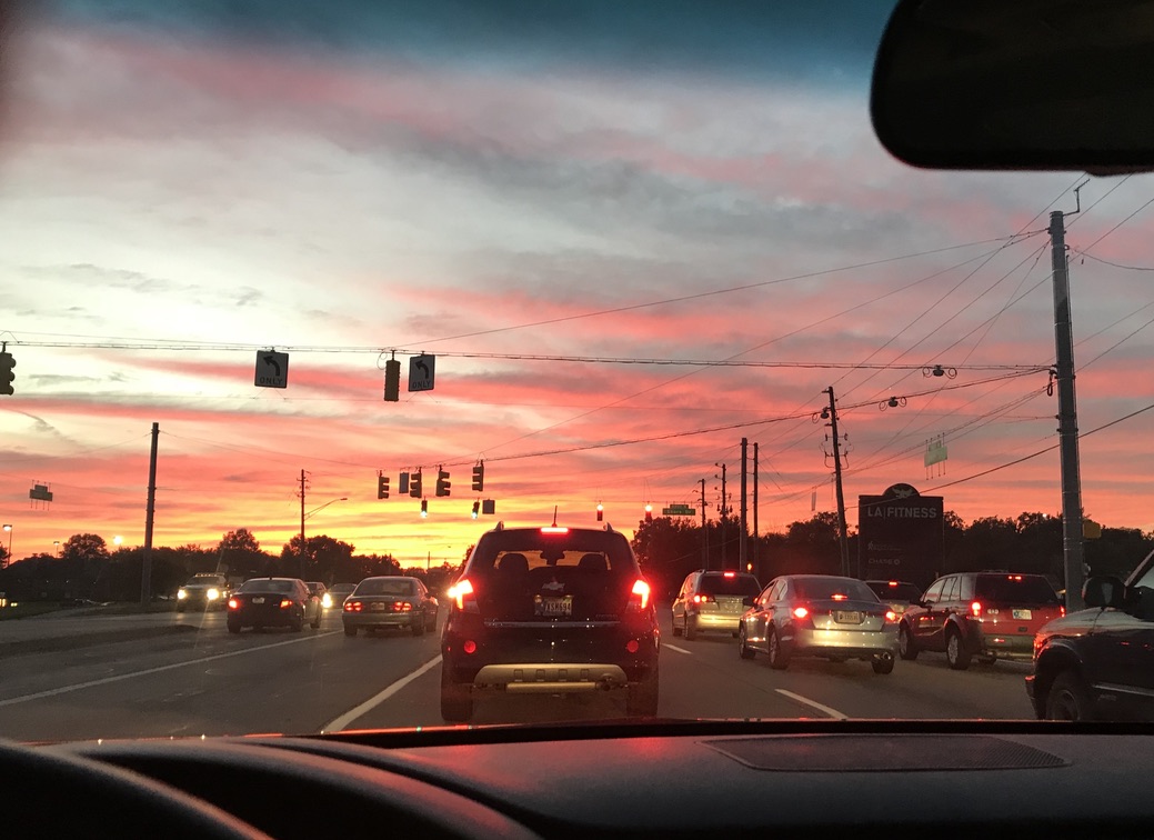 Sunset taken at stoplight in car