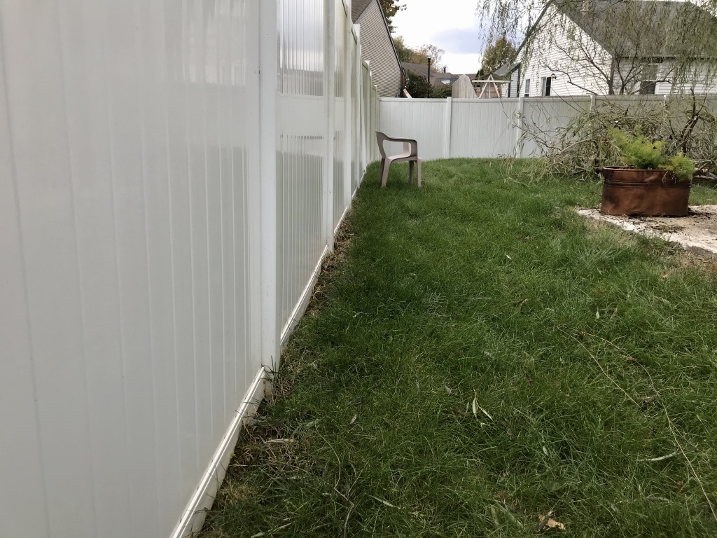 White 6 foot plastic fence 