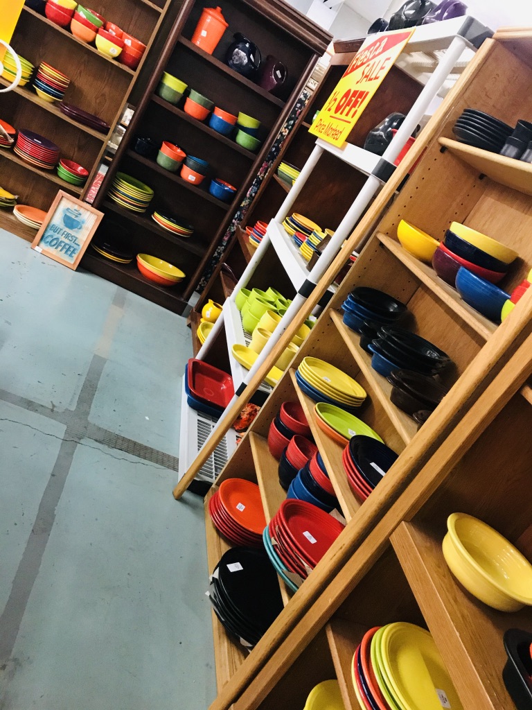 Shelves of multi colored Fiesta Ware